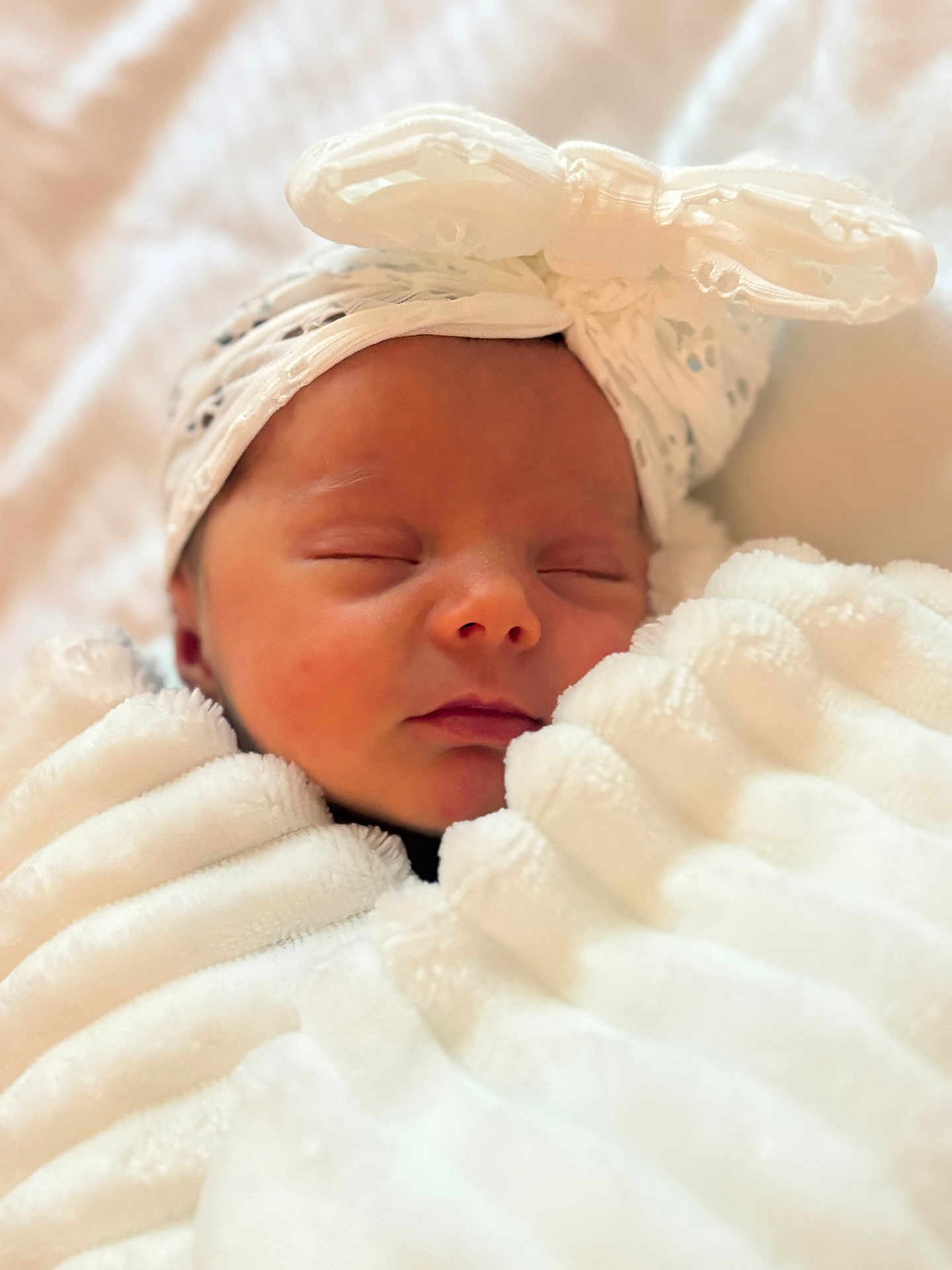 Rylee joined the competition — help win amazing prizes! newborn, baby, sleeping, blanket, headband, bow, closeup, face, infant, soft, cute, cozy, portrait, wrapped, peaceful, resting, indoors, delicate, skin, child
