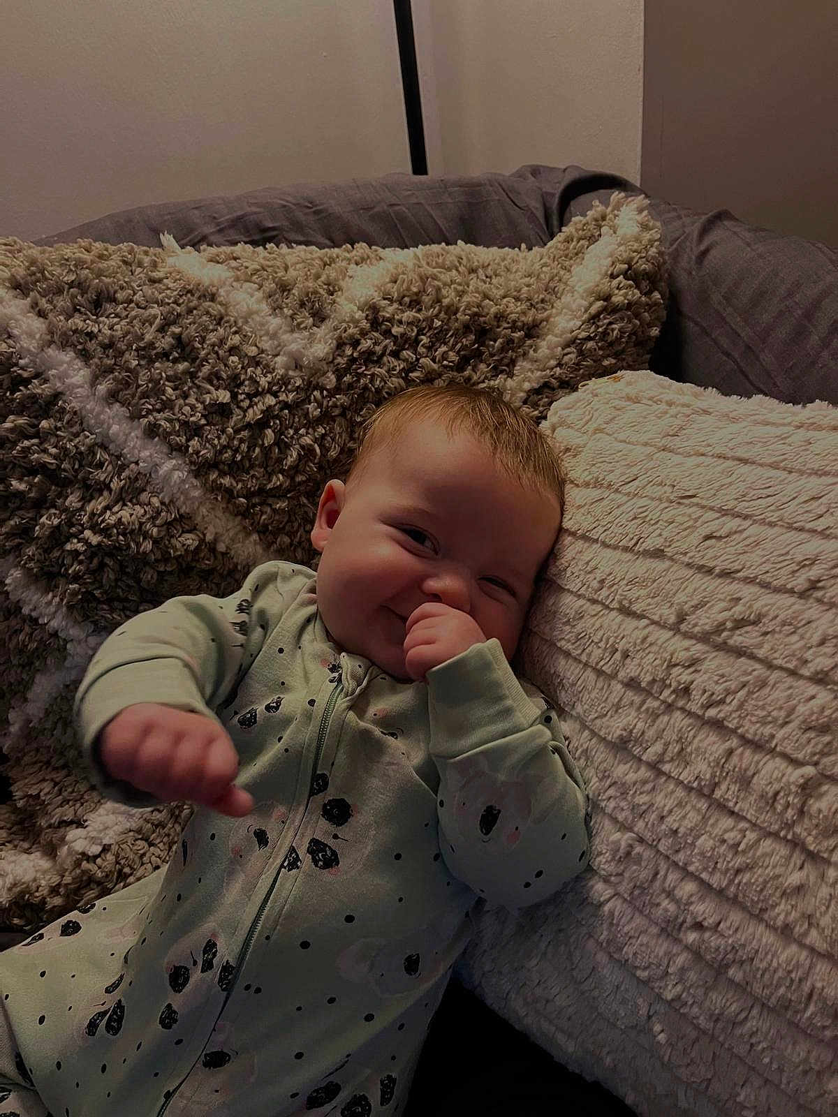 Elliott is registered to the contest to win money with this photo: baby, babylaughing, blanket, cushion, face, happy, head, homedecor, infantbed, person, photography, portrait, quilt, smile