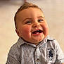 baby, child, smiling, happy, face, blue_eyes, teeth, shirt, striped_shirt, indoor, portrait, cute, infant, toddler, short_sleeve, buttoned_shirt, blurry_background, closeup, cheerful, small_child