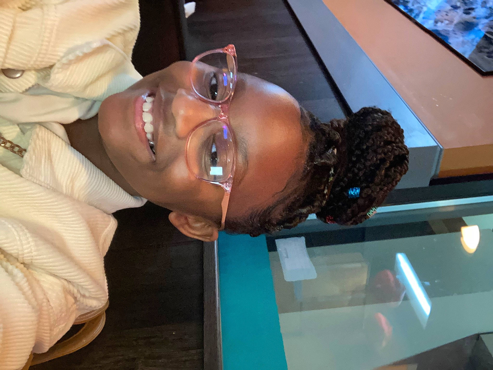 Amaris is registered to the contest to win money with this photo: audio_equipment, chest, event, eyelash, eyewear, fun, glasses, hat, jaw, joy, machine, person, smile, vision_care