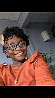 Amaris is registered to the contest to win money with this photo: child, event, eyewear, flash_photography, forehead, fun, gesture, glasses, happy, joy, laugh, person, plant, portrait, portrait_photography, room, selfie, sitting, sleeve, smile