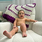 Alexander joined the competition — help win amazing prizes! baby, infant, smiling, diaper, armchair, crochet_blanket, blanket, nursery, curtain, window, stuffed_animal, plush_toy, toes, feet, happy, portrait, cozy, soft_texture, interior, child