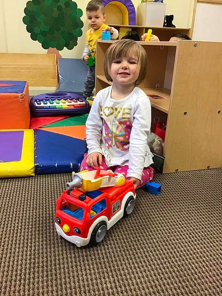 Lilly Marie joined the competition — help win amazing prizes! automotive_design, baby_products, baby_toys, chair, child, event, flooring, flowerpot, fun, joy, motor_vehicle, person, riding_toy, room, shipping_box, snapshot, tire, toddler, toy, toy_vehicle