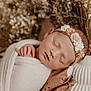 Cléa participe au concours pour gagner de l'argent avec cette photo : newborn, baby, sleeping, blanket, headband, flower, basket, dried_flowers, soft_texture, cozy, wrapped, peaceful, infant, portrait, closeup, skin, hand, cute, resting, indoors