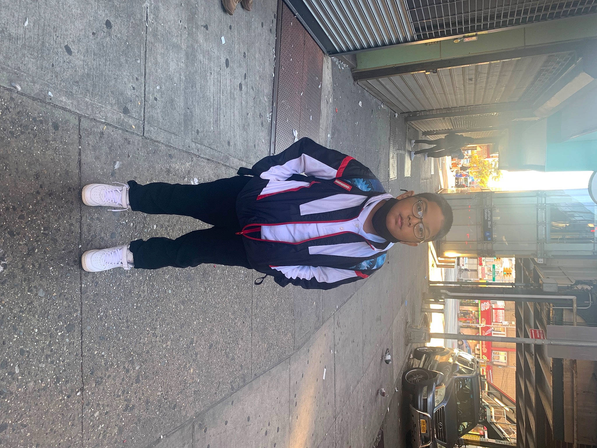 Aiden joined the competition — help win amazing prizes! asphalt, automotive_lighting, carmine, city, concrete, eyewear, human_leg, machine, pattern, pedestrian, person, road, road_surface, shadow, sidewalk, smile, street, tints_and_shades