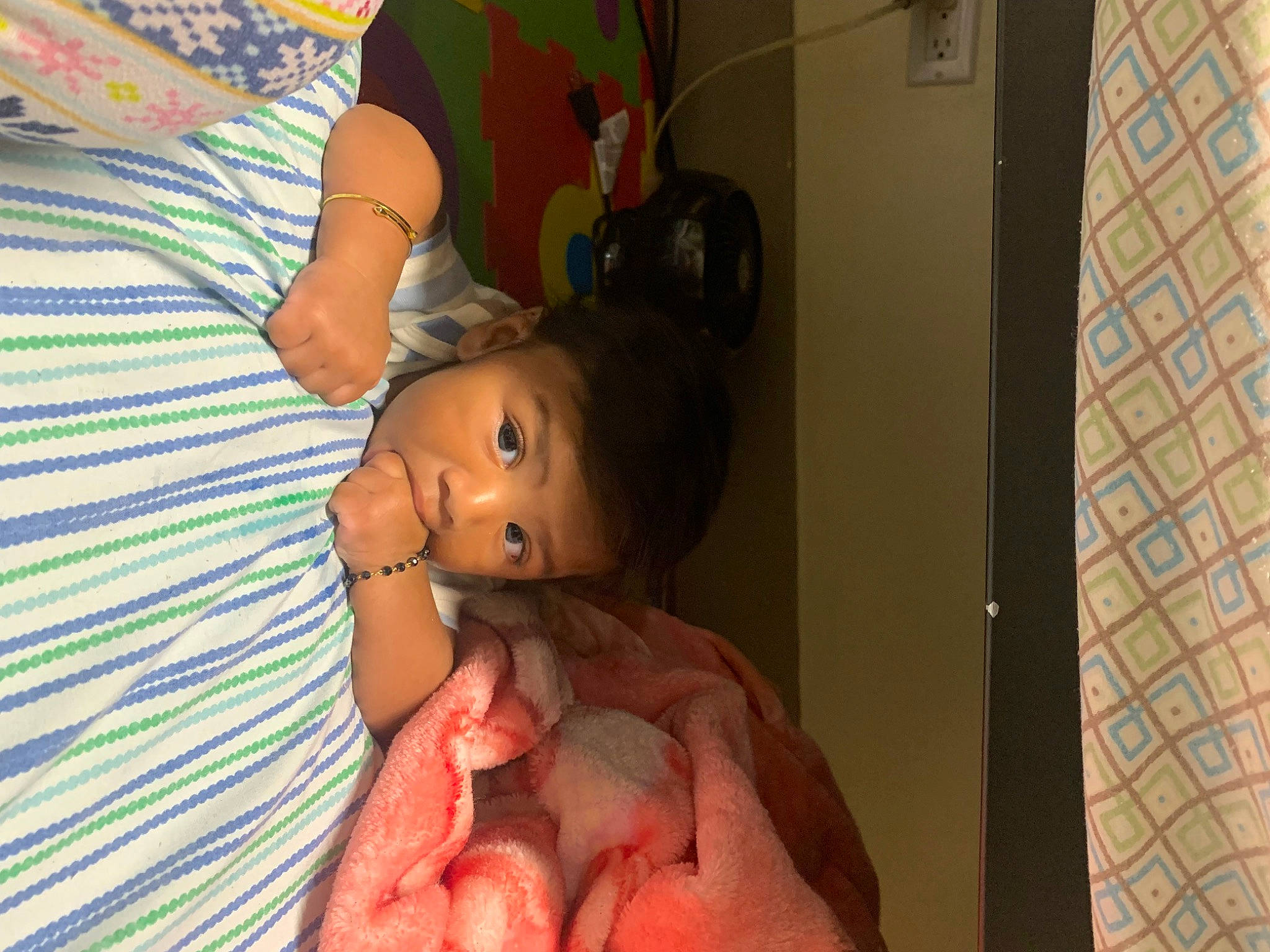 Armani is registered to the contest to win money with this photo: abdomen, baby, barechested, bathing, bed, chest, child, eyelash, flesh, fun, gesture, happy, nail, person, room, thumb, toddler, toy, trunk, vacation