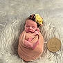 baby, infant, swaddle, flower_headband, sleeping, blanket, soft_texture, newborn, peaceful, portrait, cute, wrapped, resting, child, one_month, head, skin, small, cozy, indoor