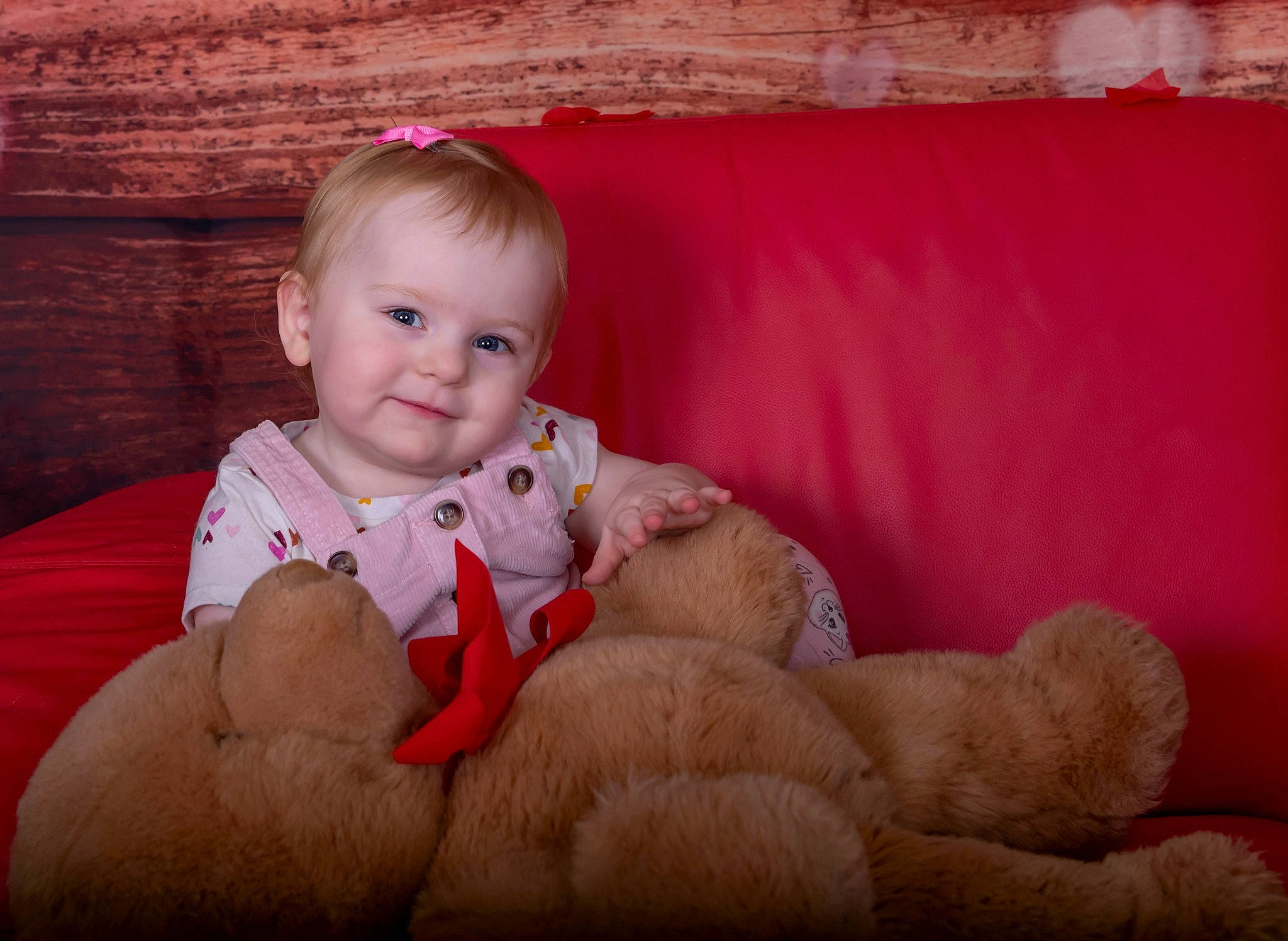 Jemma joined the competition — help win amazing prizes! arm, baby, child, comfort, couch, dress, face, fawn, flash_photography, hand, happy, human_body, joy, lap, leg, person, pink, skin, thigh, toddler