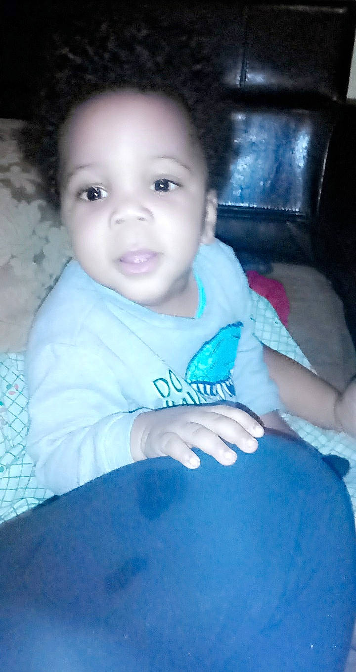 Kashmir is registered to the contest to win money with this photo: baby, black_hair, blue, cheek, child, cool, eye, eyebrow, face, forehead, fun, head, iris, lip, mouth, nose, person, sitting, skin, smile