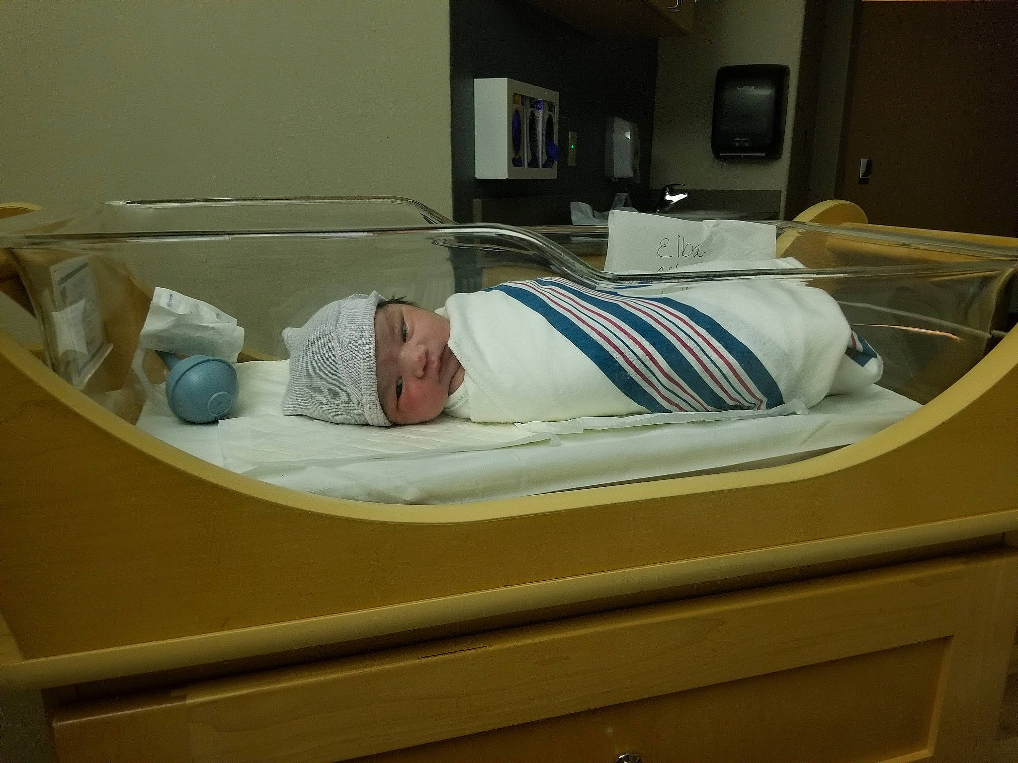 Jojo is registered to the contest to win money with this photo: baby, bed, bed_frame, bed_sheet, bedroom, birth, box_spring, child, childbirth, comfort, drawer, furniture, headwear, hospital, hospital_bed, infant_bed, linens, mattress, nap, person