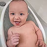 Giovanni is registered to the contest to win money with this photo: baby, infant, child, smiling, happy, portrait, bathroom, bath_seat, bathtub, wet, bare_chested, blue_eyes, brown_hair, face, hands, arms, belly, indoor, close_up, candid