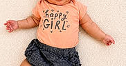 Calissia is registered to the contest to win money with this photo: baby, child, chubby_arms, chubby_legs, closeup, clothing, cute, girl, happy_girl_shirt, headband, indoors, infant, lying_down, pink_bow, portrait, skin, smiling, socks, soft_blanket, three_months_sign