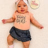 Calissia is registered to the contest to win money with this photo: baby, infant, girl, pink_bow, headband, happy_girl_shirt, three_months_sign, soft_blanket, cute, smiling, lying_down, clothing, socks, skin, chubby_arms, chubby_legs, portrait, child, indoors, closeup