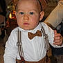 Paolo participe au concours pour gagner de l'argent avec cette photo : child, toddler, boy, face, blue_eyes, hat, bow_tie, suspenders, white_shirt, brown_pants, indoor, portrait, cute, baby, person, fashion, holding, curious, expression, clothing