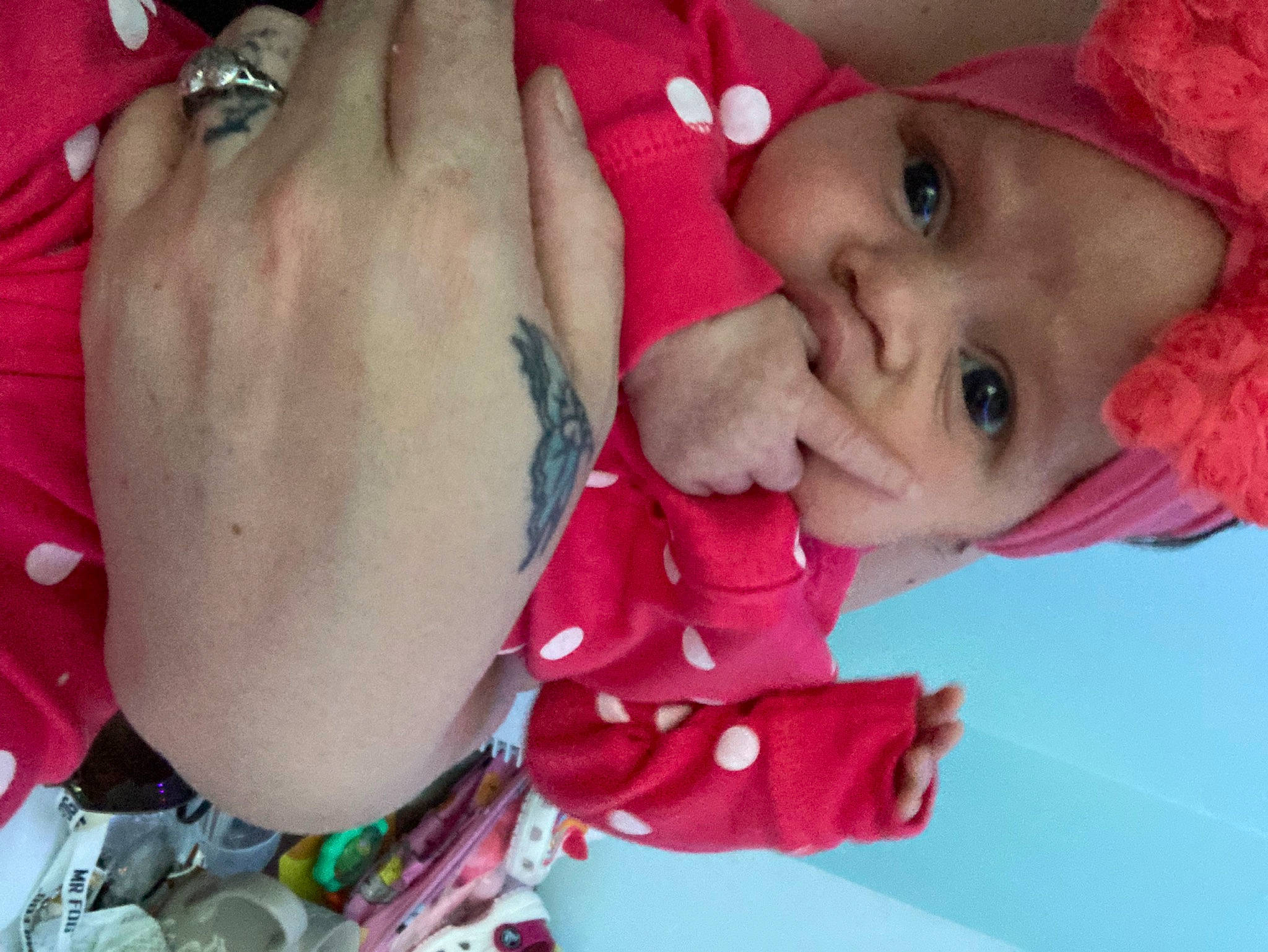 Remy is registered to the contest to win money with this photo: baby, cheek, eyebrow, eyelash, fun, gesture, happy, headwear, human_body, lip, magenta, mouth, nail, neck, nose, people, person, pink, red, skin