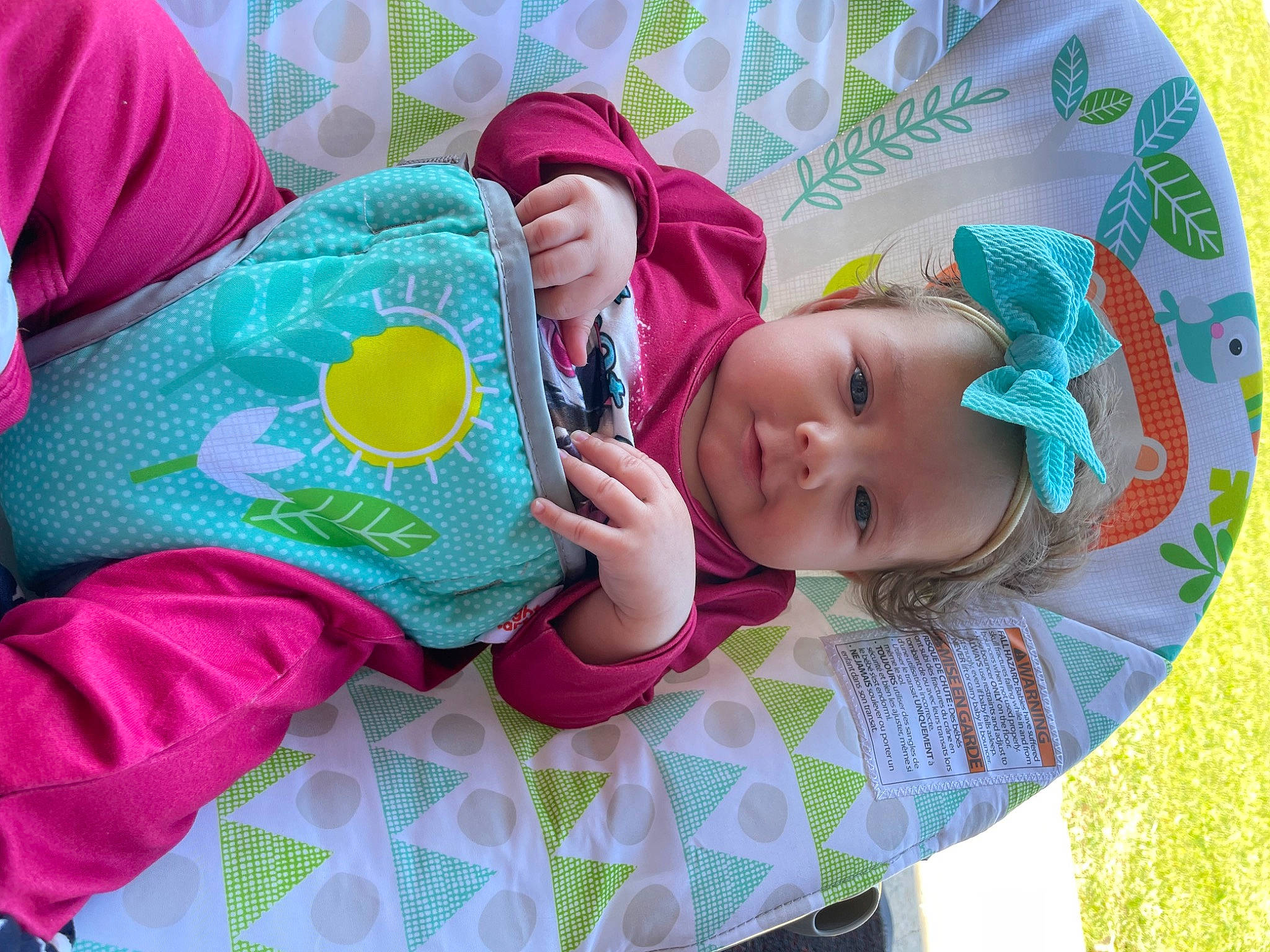 Hazel joined the competition — help win amazing prizes! baby, baby_products, baby_toddler_clothing, child, comfort, facial_expression, fashion_accessory, green, hand, happy, hat, linens, pattern, person, pink, play, purple, skin, sleeve, textile
