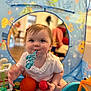 baby, child, tent, toy, play, indoor, cute, smiling, balls, blue, orange, red, white_clothing, floor, hand, foot, face, chewing, colorful, home