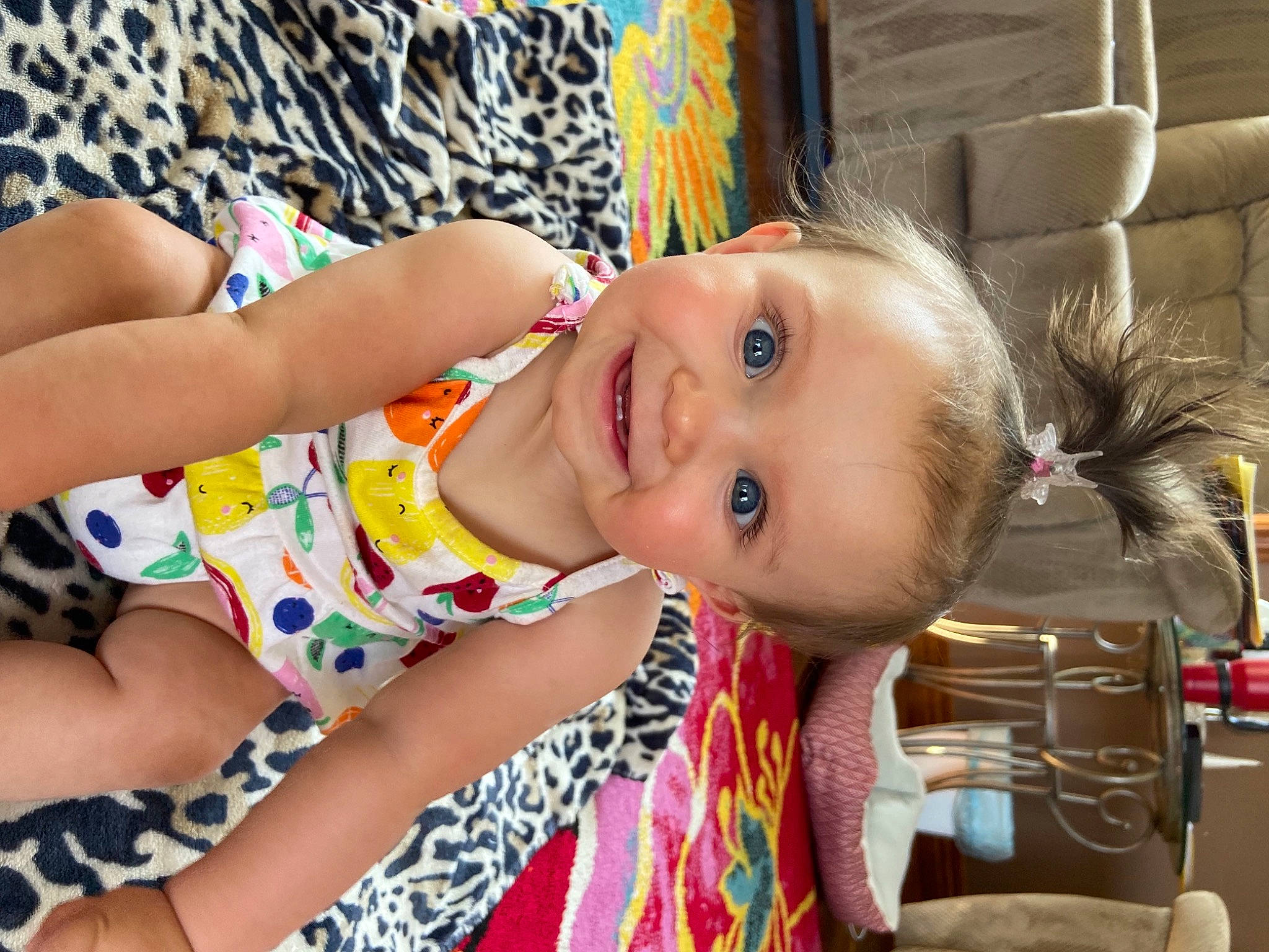 Ella is registered to the contest to win money with this photo: baby_toddler_clothing, cheek, child, elbow, facial_expression, fun, happy, head, human_body, iris, joy, leisure, mouth, neck, nose, pattern, person, skin, smile, t_shirt