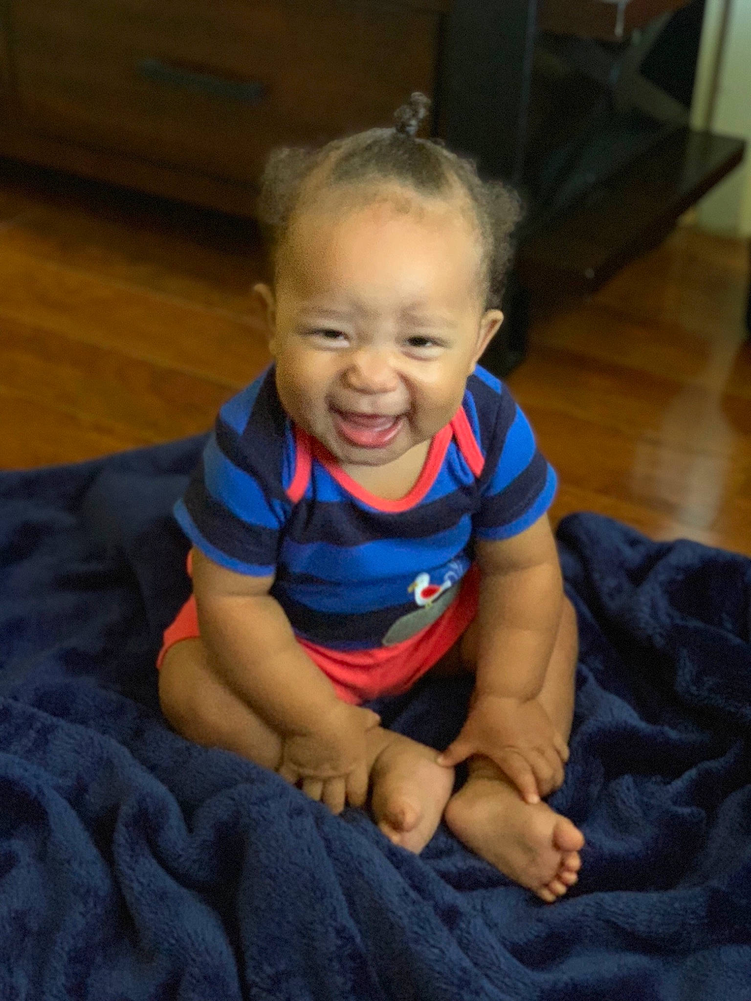 Jaylyn joined the competition — help win amazing prizes! arm, cheek, child, facial_expression, finger, joy, leg, person, play, sitting, skin, smile, toddler