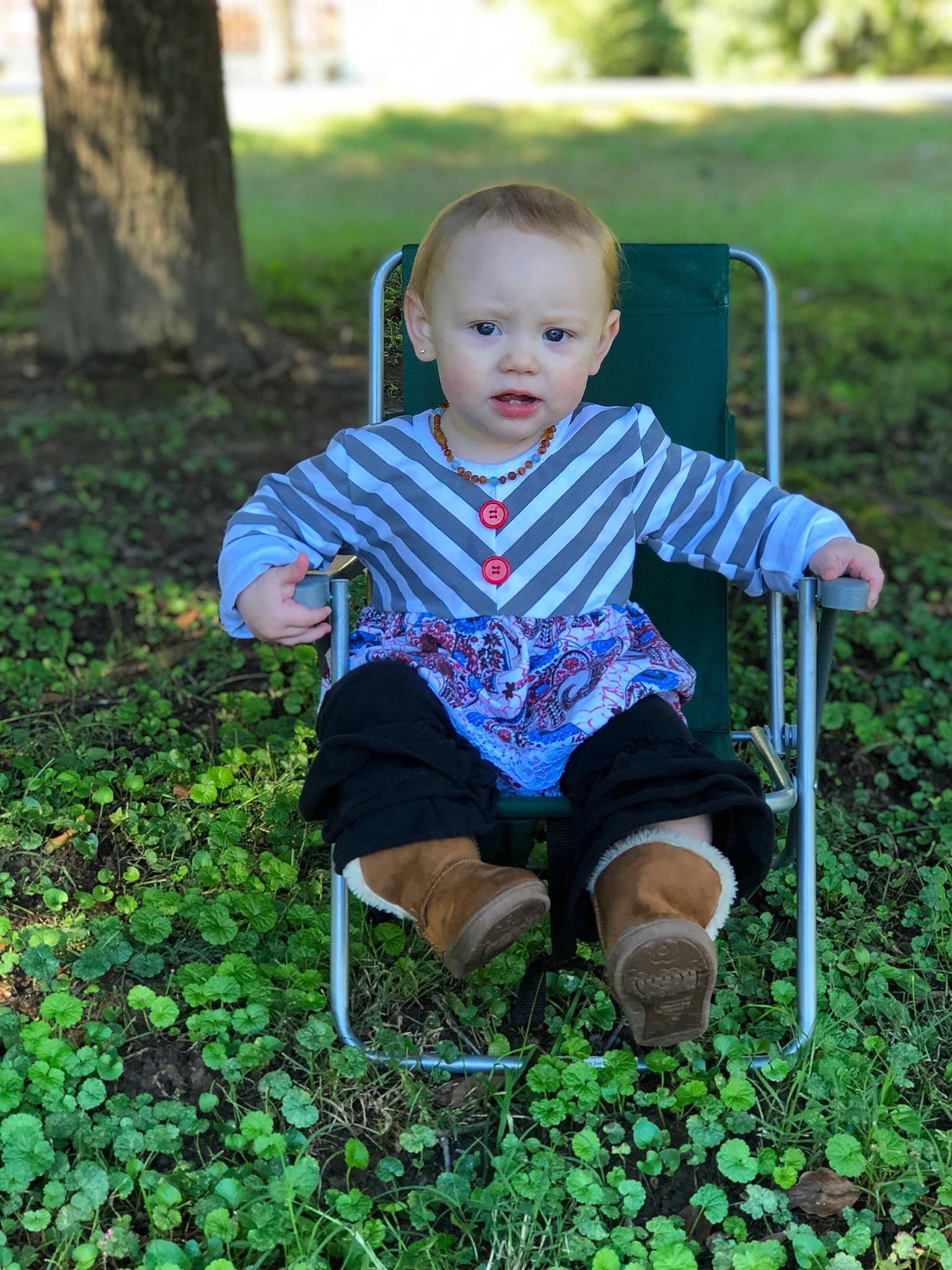 Emma Grace is registered to the contest to win money with this photo: child, fun, garden, grass, grass_family, infant, lawn, leaf, meadow, nature, person, plant, play, recreation, sitting, smile, toddler, tree