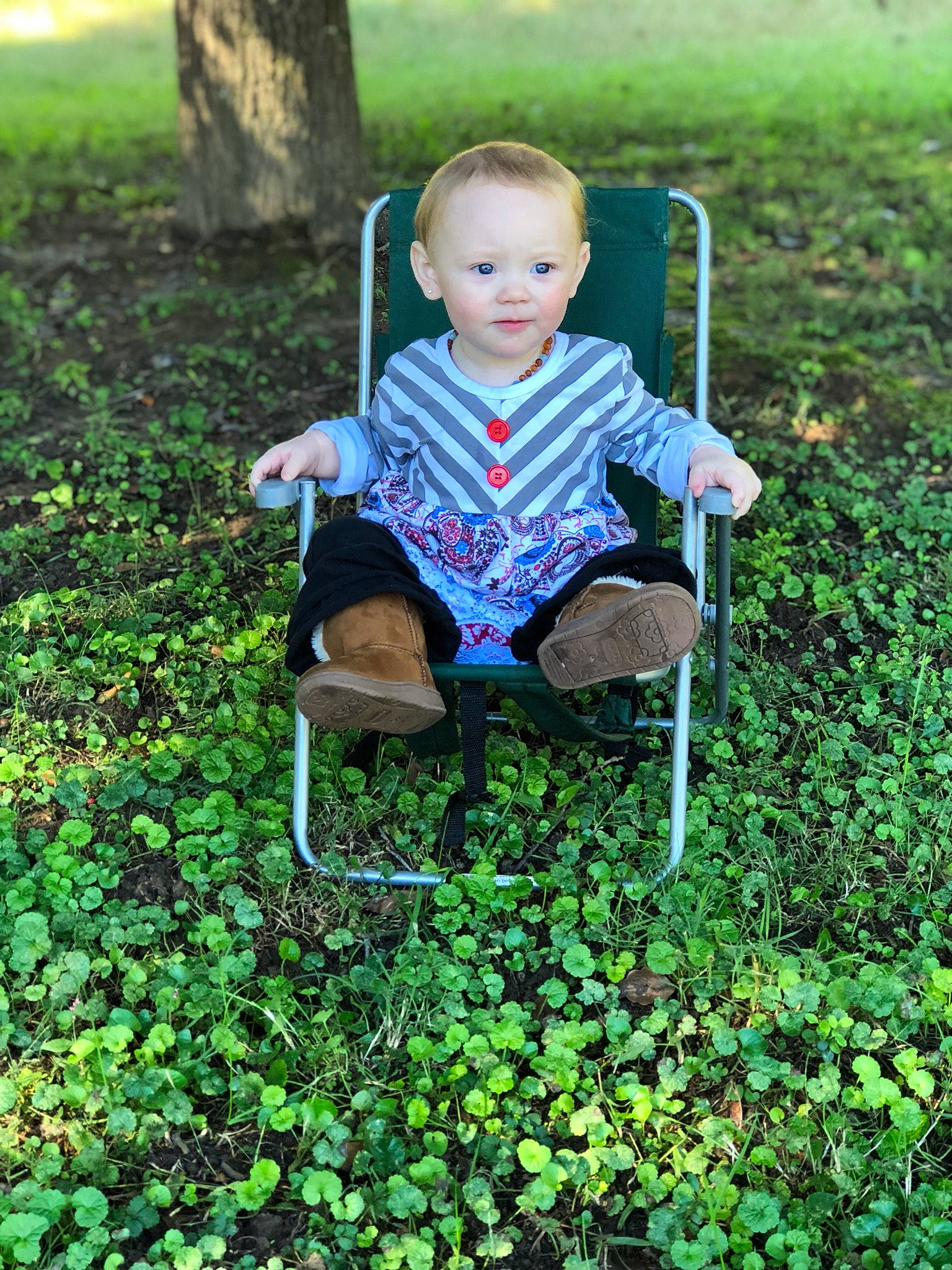 Emma Grace is registered to the contest to win money with this photo: child, garden, girl, grass, grass_family, green, lawn, leaf, meadow, person, plant, play, shrub, sitting, spring, toddler, tree, yard