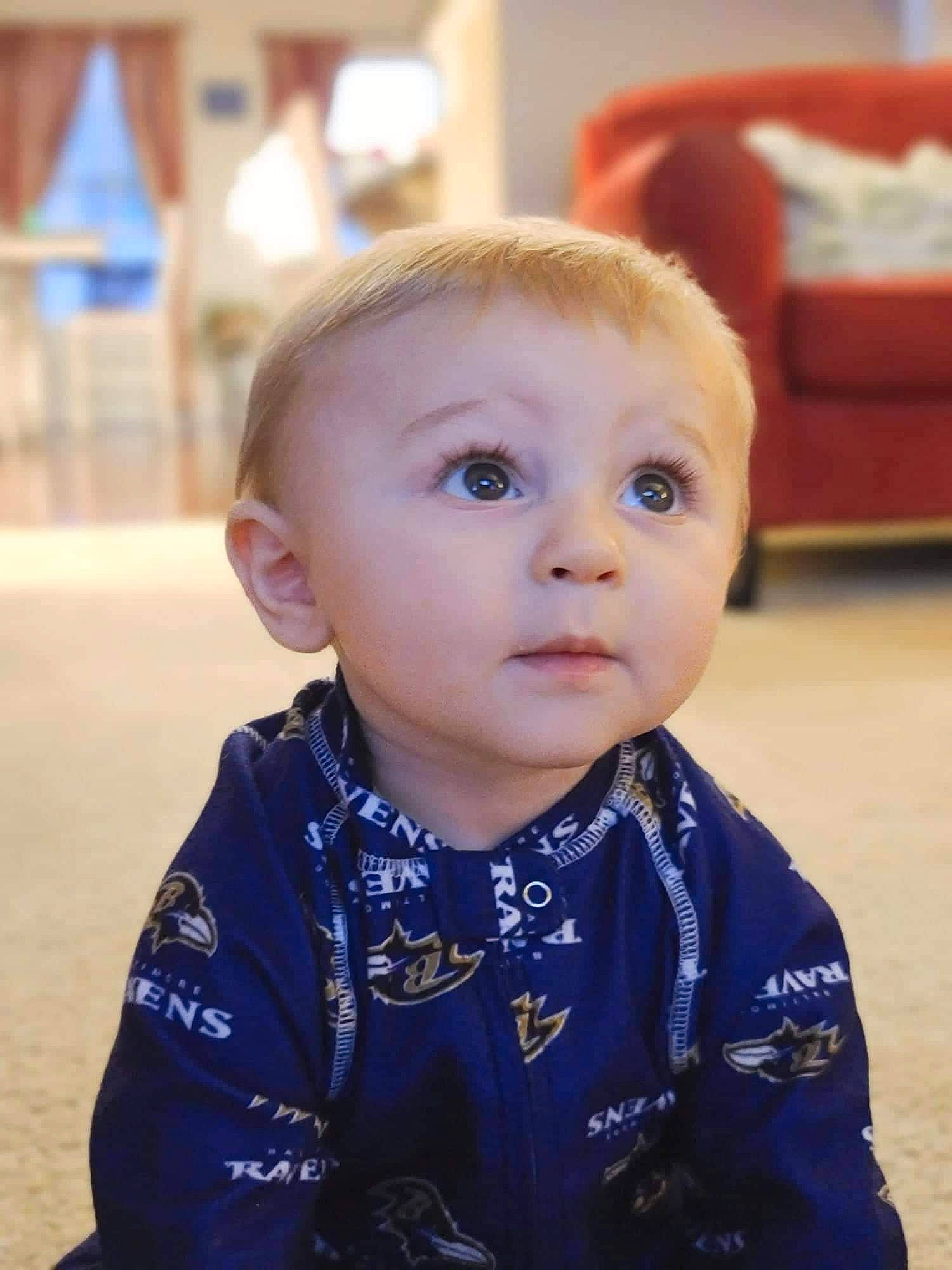 Odin joined the competition — help win amazing prizes! baby, baby_toddler_clothing, cheek, child, electric_blue, eye, flooring, fun, hair, happy, head, iris, nose, person, sitting, skin, sleeve, smile, surprise, t_shirt