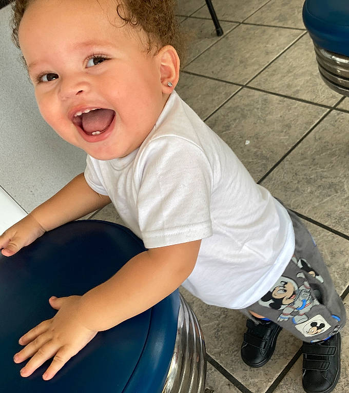 Jiovanni joined the competition — help win amazing prizes! automotive_tire, baby, baby_toddler_clothing, blue, comfort, cool, finger, flooring, fun, hairstyle, happy, knee, leg, person, shoe, skin, sleeve, smile, sneakers, t_shirt