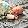 baby, sleeping, blanket, bed, bedspread, infant, peaceful, cozy, clothing, striped, hand, face, head, skin, indoors, rest, quiet, soft, cute, newborn