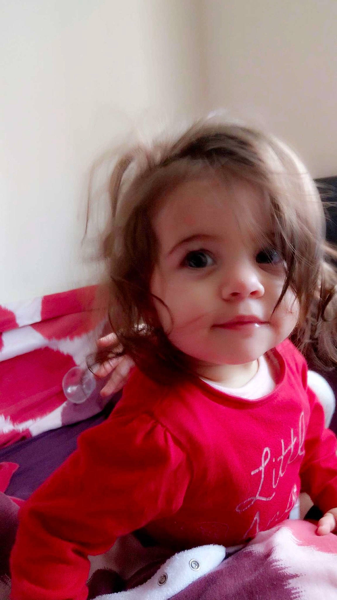 Kate is registered to the contest to win money with this photo: baby, brown_hair, cheek, child, daughter, eye, face, hair, happy, head, lip, mouth, nose, person, pink, play, skin, smile, toddler