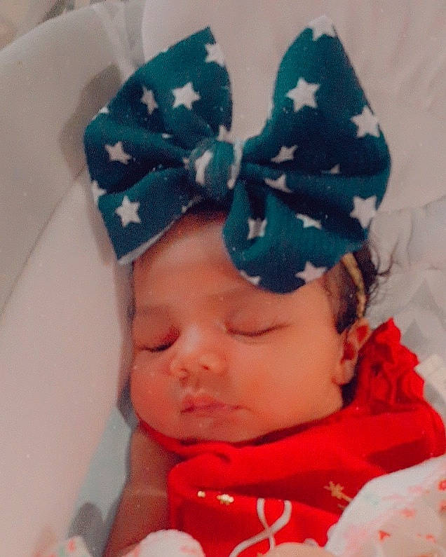 Bryleigh is registered to the contest to win money with this photo: baby, baby_toddler_clothing, cap, cheek, child, ear, fashion_accessory, hair_accessory, head, headband, headgear, headpiece, headwear, lip, person, toddler