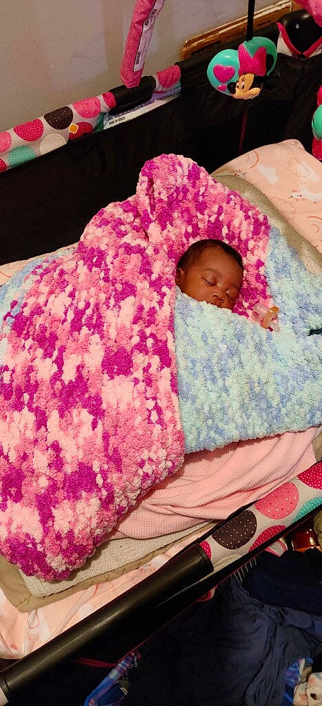 Gabriella is registered to the contest to win money with this photo: baby, baby_products, baby_sleeping, baby_toddler_clothing, bedtime, comfort, linens, magenta, nap, person, pink, purple, sleep, textile, thread, violet