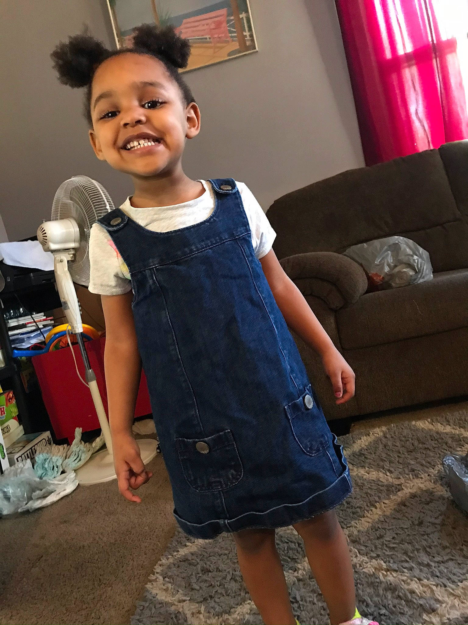 Anisia is registered to the contest to win money with this photo: ankle, baby_toddler_clothing, couch, day_dress, dress, foot, household_supply, interior_design, joy, lamp, living_room, one_piece_garment, pattern, person, picture_frame, pillow, sandal, sofa_bed, studio_couch, throw_pillow