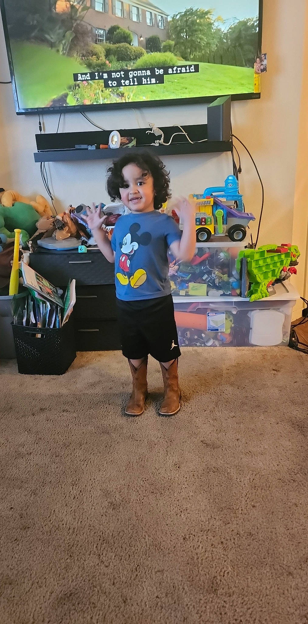 Luciano joined the competition — help win amazing prizes! advertising, art, automotive_design, child, flip_flops, flooring, fun, joy, leisure, motor_vehicle, person, picture_frame, play, recreation, room, sandal, shorts, t_shirt, television, toddler