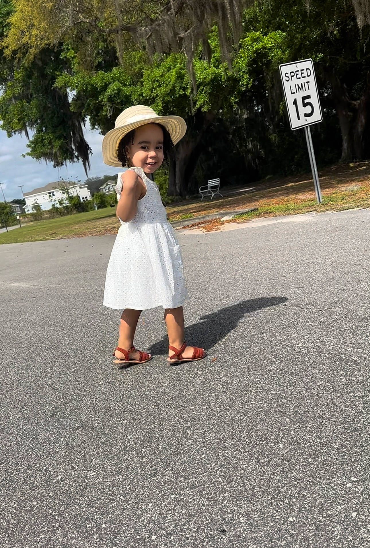 Heaven is registered to the contest to win money with this photo: asphalt, dress, fedora, grass, happy, hat, headwear, joy, landscape, leaf, leg, leisure, people_in_nature, person, plant, road, road_surface, sky, sun_hat, tar