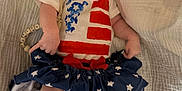 Oaklynn joined the competition — help win amazing prizes! baby, infant, pacifier, headband, bow, clothing, stars, stripes, blanket, lying_down, cute, bracelet, soft, white, blue, red, skin, legs, arms, indoors