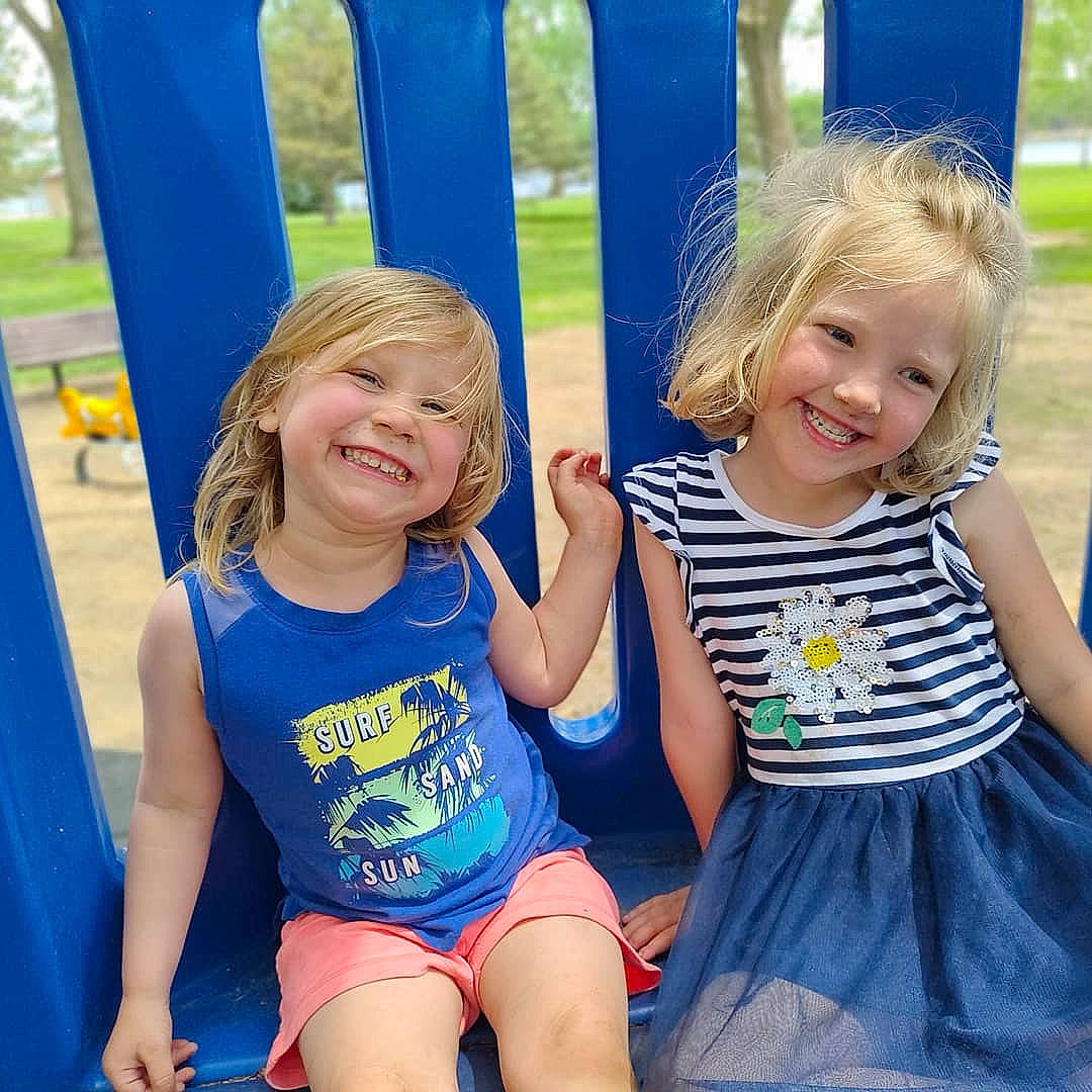 Tailynn joined the competition — help win amazing prizes! baby_toddler_clothing, blue, facial_expression, fun, gesture, grass, green, hair, hairstyle, happy, joy, leisure, light, nature, people_in_nature, person, photograph, product, public_space, smile