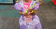 Niyara Hayes joined the competition — help win amazing prizes! child, girl, princess, dress, purple, tiara, wand, arcade, indoor, carpet, person, colorful, toy, play, floor, lighting, costume, young, portrait, fun