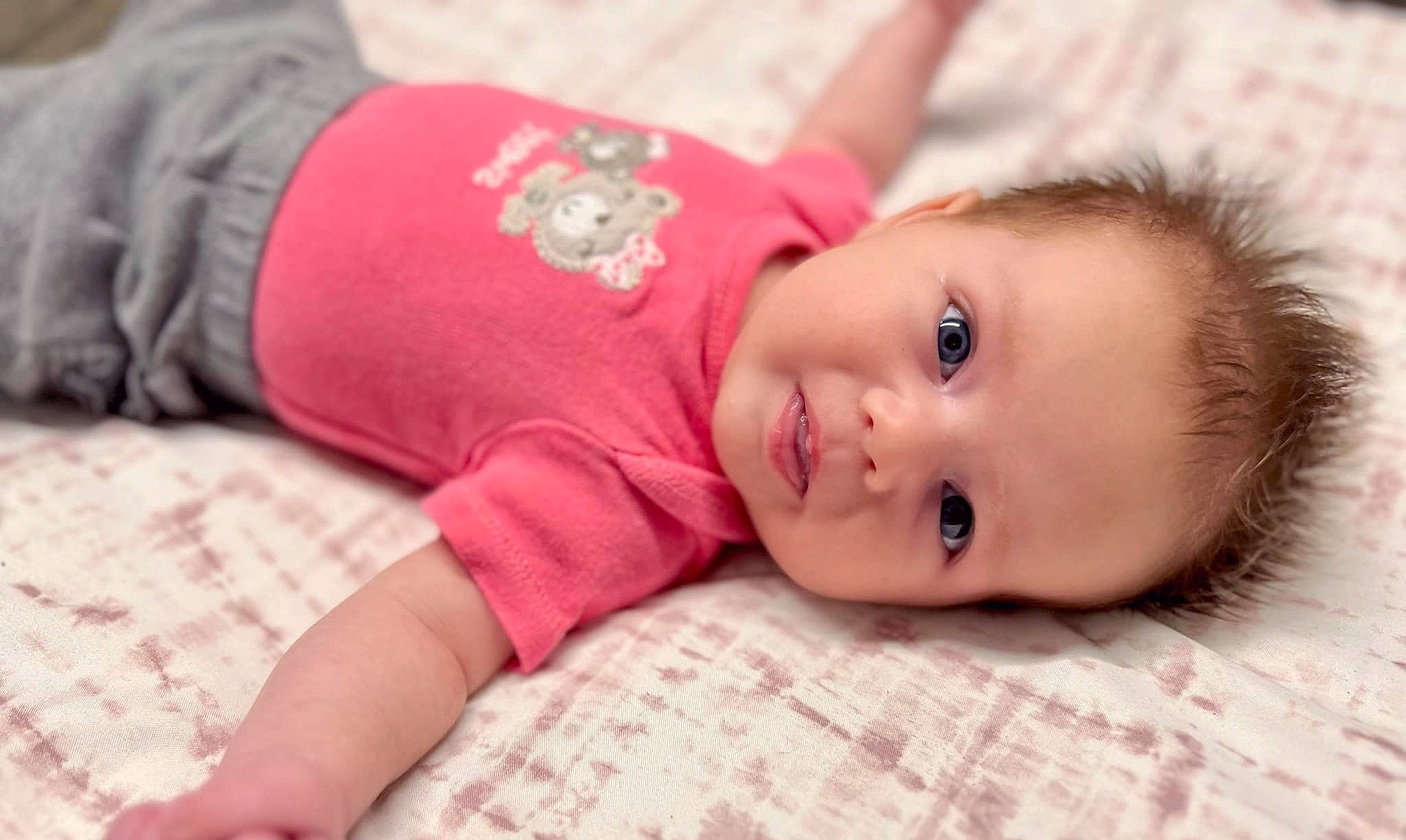 Jaylee is registered to the contest to win money with this photo: baby, baby_toddler_clothing, cheek, comfort, eye, eyelash, face, happy, head, human_body, iris, lip, mammal, nose, person, skin, sleeve, textile, toddler, vertebrate