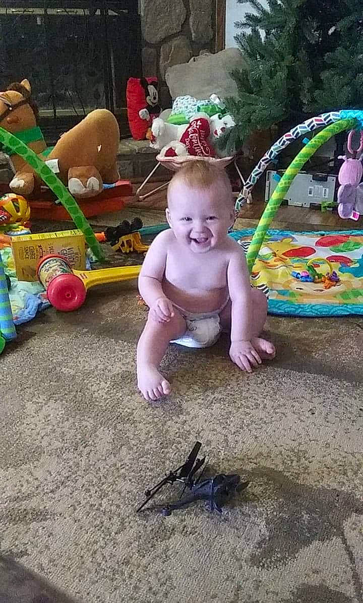 Alvin is registered to the contest to win money with this photo: baby, child, fun, joy, leg, person, play, smile, toddler, toy