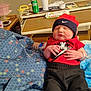 Lyric joined the competition — help win amazing prizes! newborn, baby, sleeping, hat, nike, jordan, clothing, blanket, hospital, bed, cup, sprite, wipes, person, infant, resting, indoor, medical, comfort, tattoo