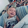 Nolan joined the competition — help win amazing prizes! baby, smiling, infant, blanket, pillow, sleepy, happy, indoor, closeup, cute, child, comfort, resting, person, clothing, toddler, relaxed, portrait, soft, cozy