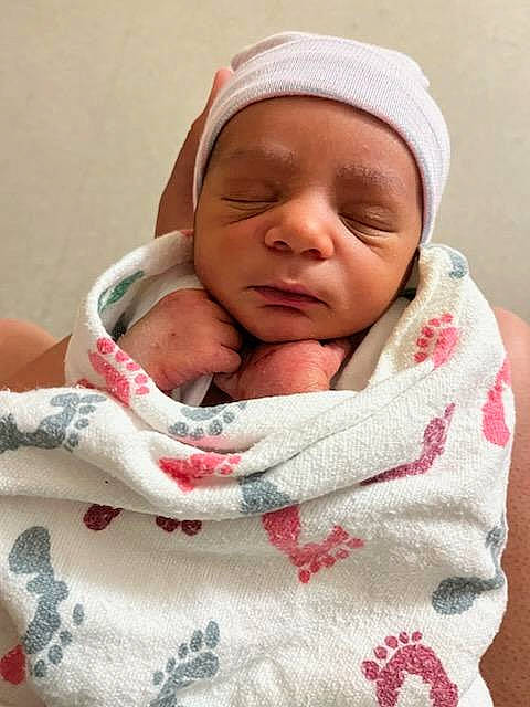 Braxton is registered to the contest to win money with this photo: baby, baby_products, baby_sleeping, baby_toddler_clothing, bedtime, carmine, cheek, child, comfort, event, eyebrow, headwear, linens, nap, nose, person, pink, skin, sleep, textile