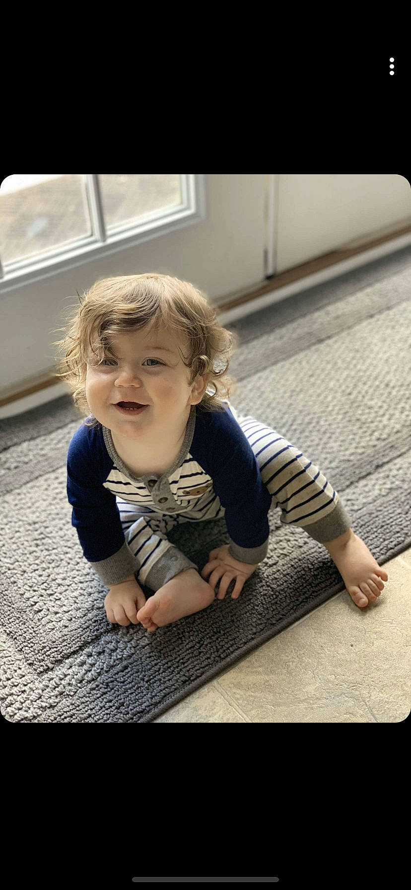 Tatum is registered to the contest to win money with this photo: arm, child, crawling, floor, flooring, fun, joy, person, photography, play, sitting, smile, toddler, wood