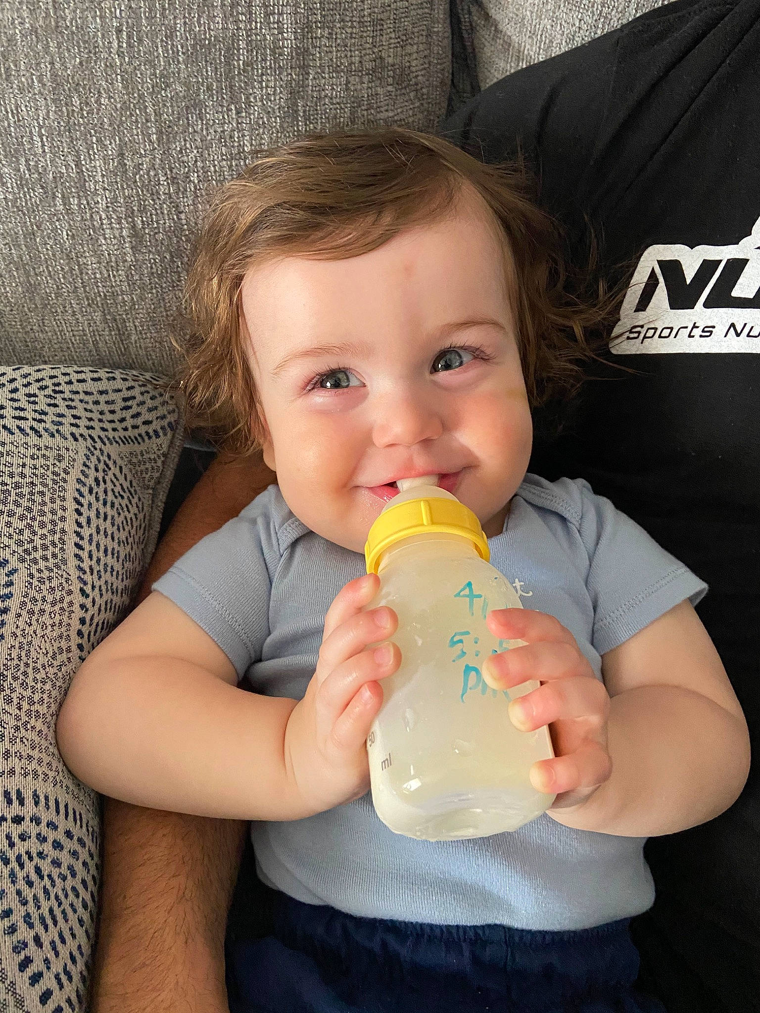 Tatum is registered to the contest to win money with this photo: baby, baby_bottle, baby_products, bottle, child, drink, drinking, drinkware, infant_formula, joy, mouth, person, plastic_bottle, product, toddler, water