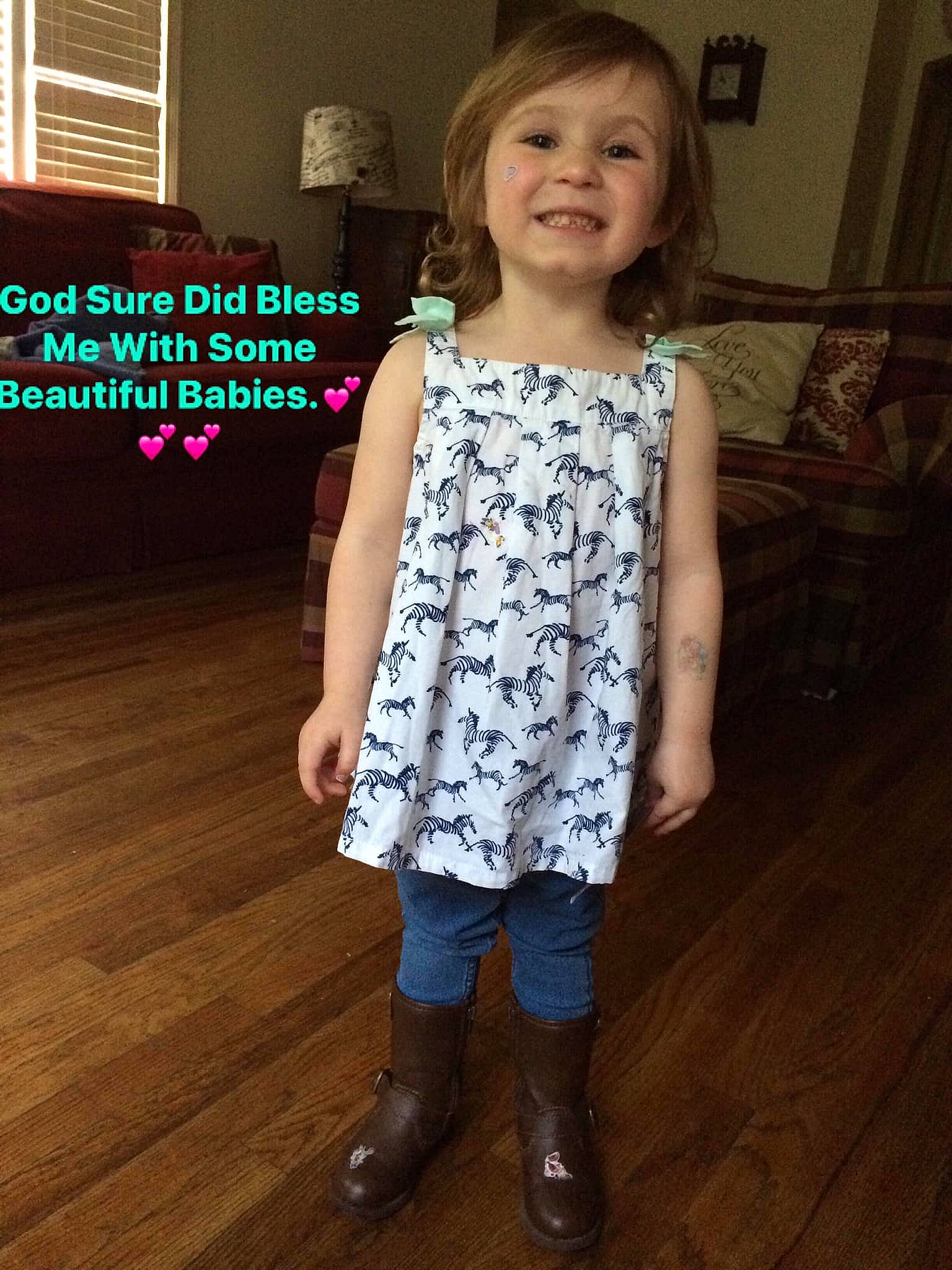 Layla joined the competition — help win amazing prizes! child, child_model, clothing, dress, footwear, knee, pattern, person, shoe, sleeve, smile, standing, t_shirt, toddler