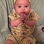 Elliana joined the competition — help win amazing prizes! baby, infant, yellow_headband, bow, bear_print, clothing, cute, hands_clasped, wide_eyes, sitting, blanket, soft, indoors, child, portrait, expression, adorable, comfortable, fabric, headwear