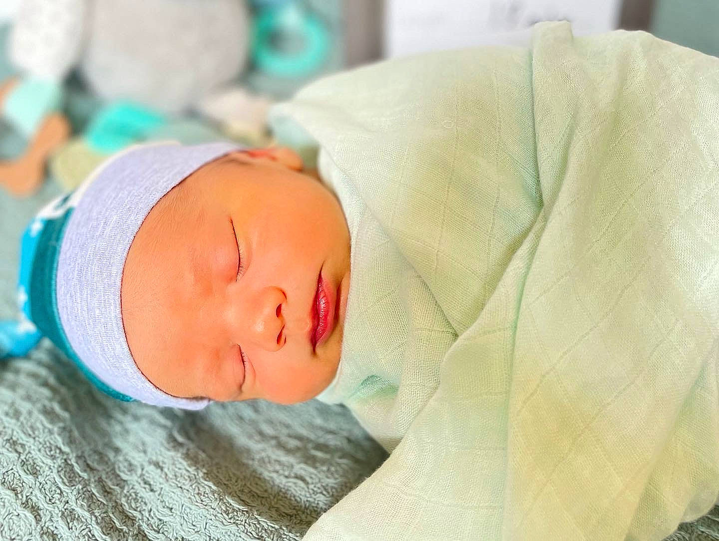 Elijah joined the competition — help win amazing prizes! baby, baby_products, baby_sleeping, baby_toddler_clothing, beanie, bedtime, cap, child, childbirth, comfort, hat, headwear, hospital, knit_cap, linens, nap, person, portrait_photography, room, sleep