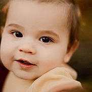 Wes joined the competition — help win amazing prizes! baby, child, close_up, cute, expression, eyes, face, golden_hour, hair, hand, infant, innocence, outdoor, person, portrait, skin, smile, soft_focus, warm_light, young