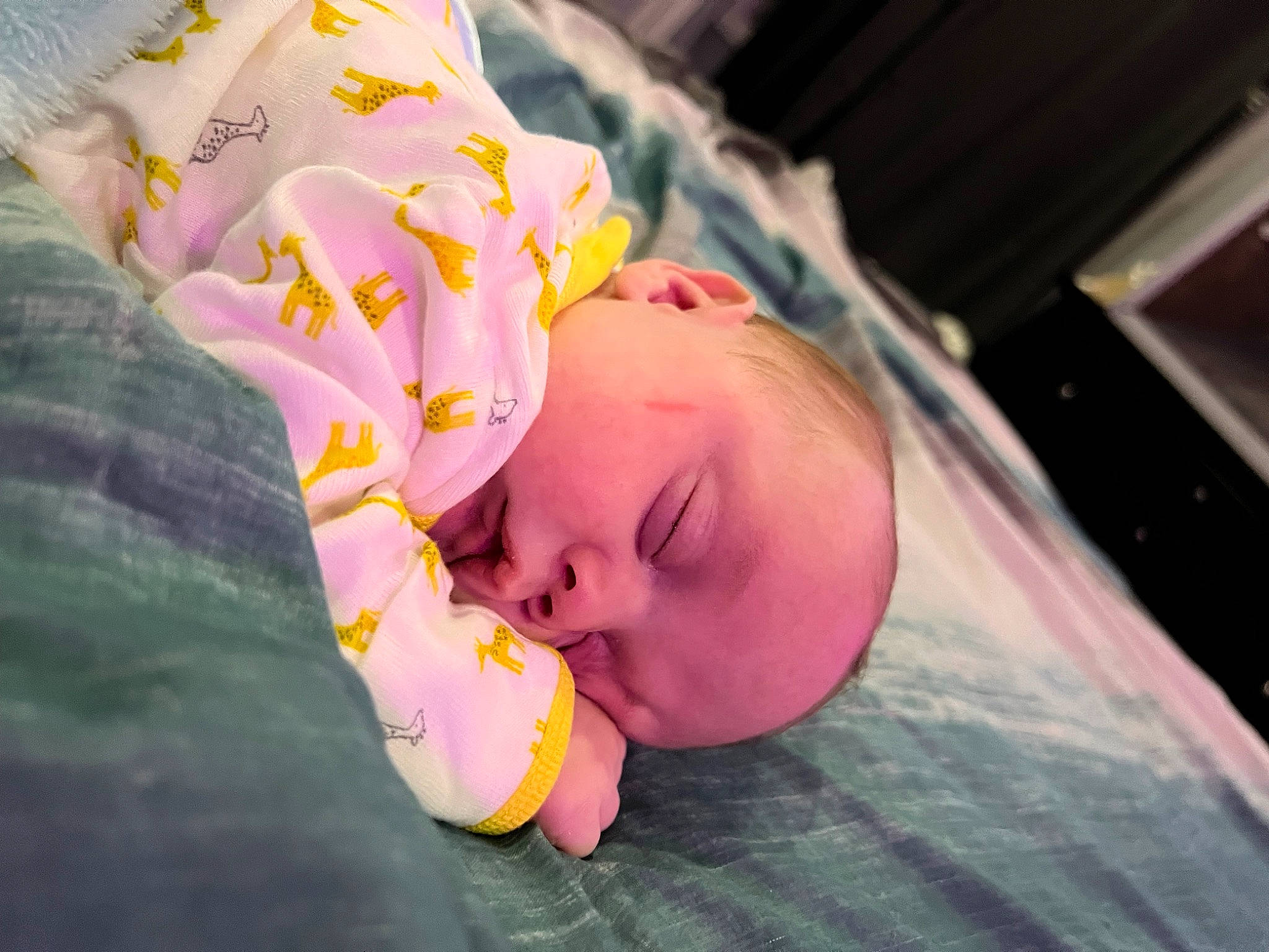 Kaison is registered to the contest to win money with this photo: baby, baby_products, baby_toddler_clothing, bedtime, cheek, child, comfort, eye, face, finger, grass, happy, head, linens, mouth, nap, nose, person, room, skin