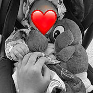Tymaël participe au concours pour gagner de l'argent avec cette photo : baby, black_and_white, blanket, child, clothing, cozy, cute, fabric, hand, holding_hand, infant, person, protective, soft, stroller, stuffed_animal, tender_moment, toy, warm, wrapped